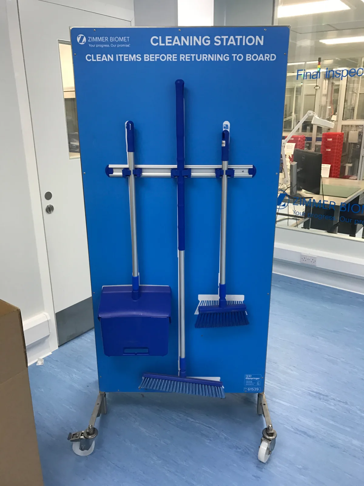 Zimmer Biomet cleanroom tool-control station with precision equipment in labelled positions