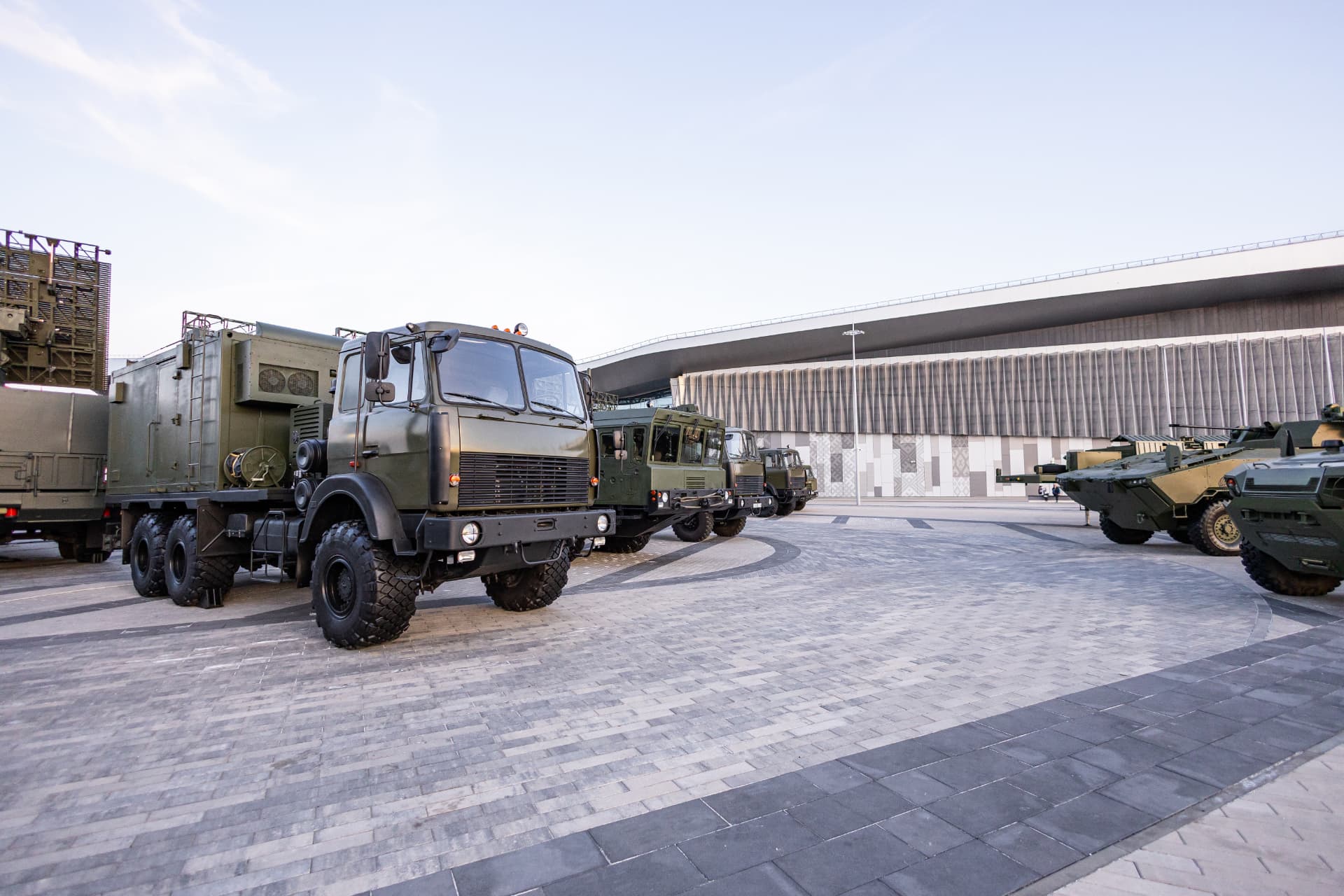 Military support vehicles outside a defence maintenance facility