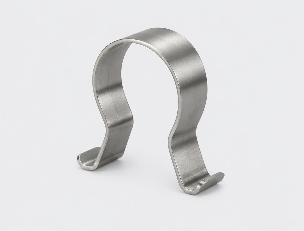 Standard stainless steel spring clip for retaining a cylindrical tool handle